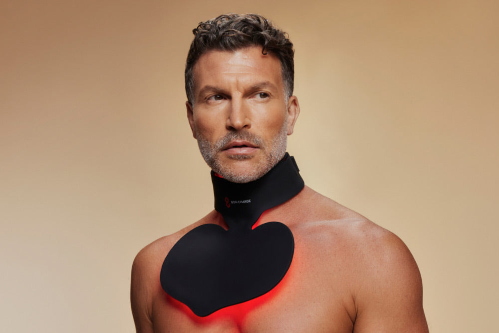 Man Wearing Red Light Neck and Chest Mask