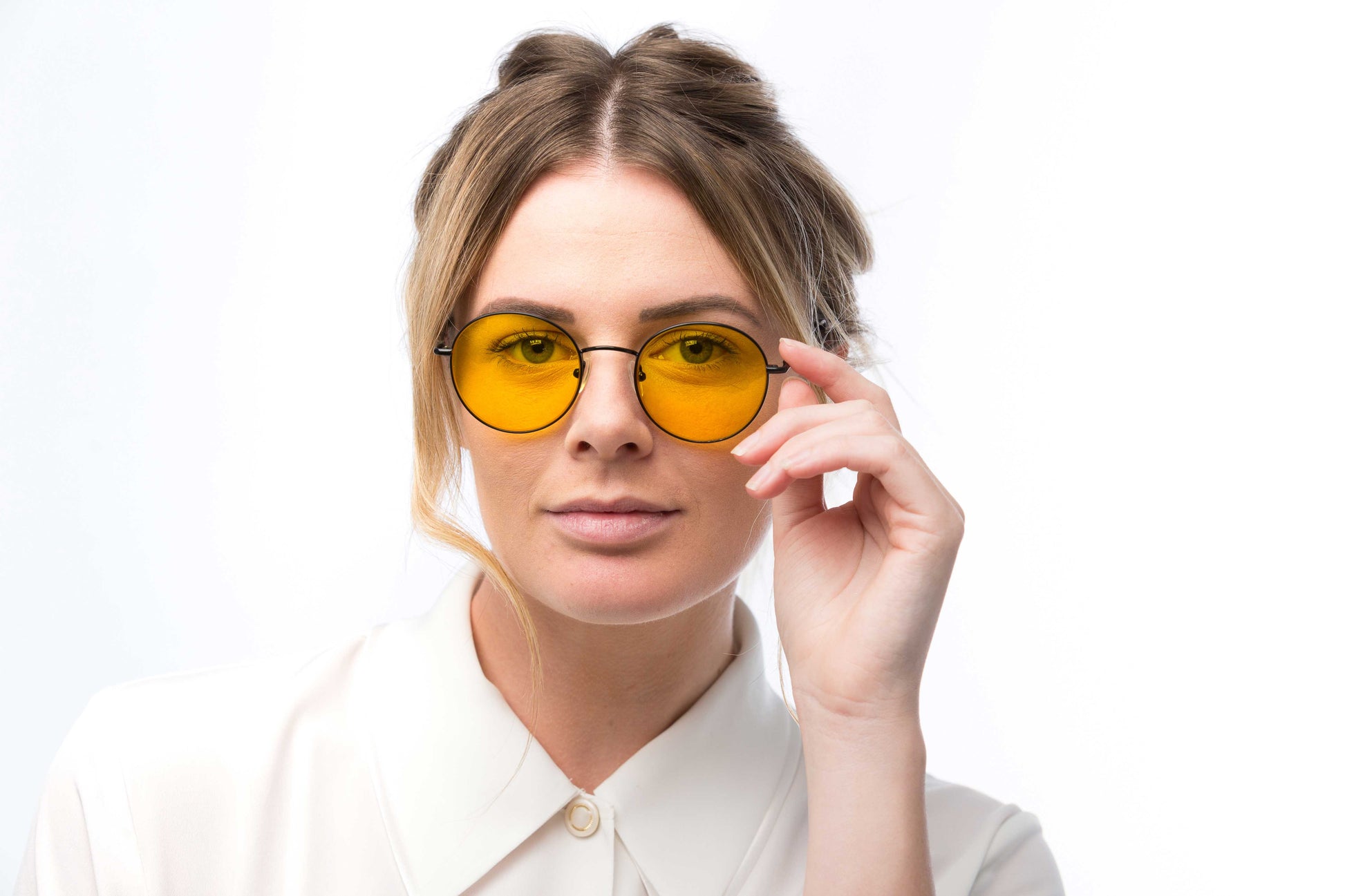 Woman Wearing Lennon Light Sensitivity Glasses Readers