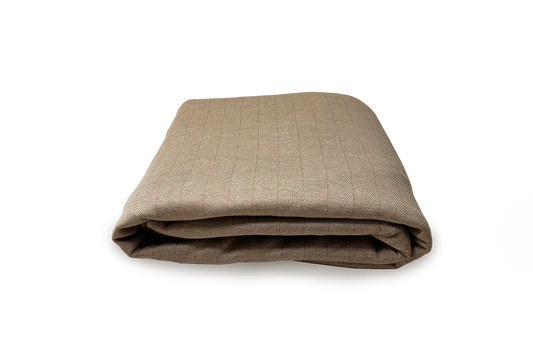 Folded gray textured EMF blanket on a transparent background